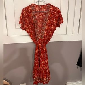 This is a medium wrap around knee length dress